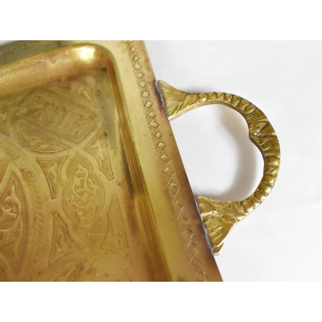 Unique hand crafted solid brass rectangular tray with handles with Islamic calligraphy design is a stunning decorative...