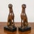 This pair of wooden dog statues captures the stylized elegance typical of the art deco period, dating back to the first...
