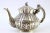 Silver Kettle with Relief Engraving and Handle Lid with Dragon Figure, in Very Good conditions. Designed 1890 to 1919 This...