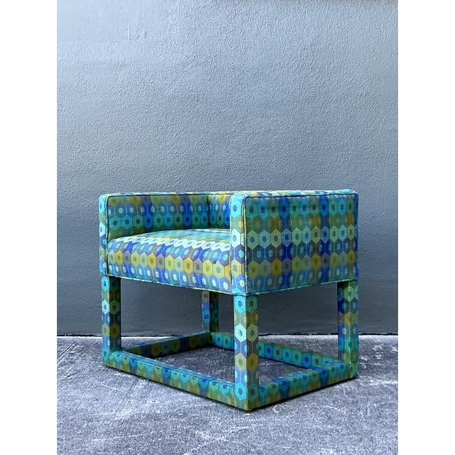 Infuse your dressing area or living space with vibrant Mid-Century Modern flair with this fully upholstered Parsons-style...