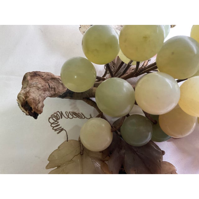 Vintage hand carved natural pale jade green stone round eight inch grape cluster with finely detailed sawtooth multi-hued...