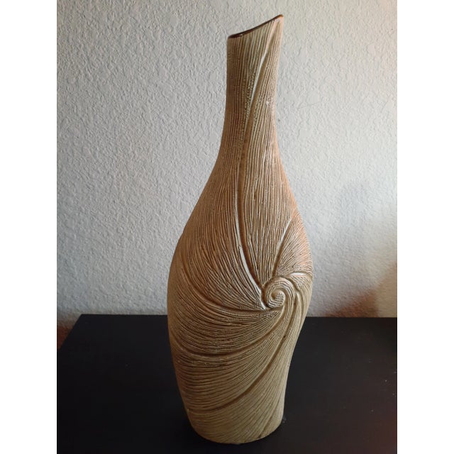 This is a Textured Glazed Ceramic 13" Tall Vase. Procured at an auction BOX D