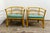 A pair of bamboo and rattan barrel shaped chairs in a natural light brown finish. Two new removable green seat cushions...