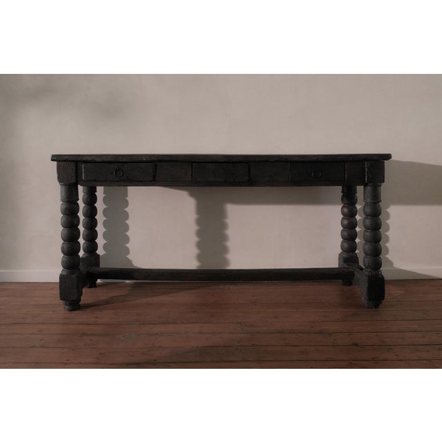 Console table composed of reclaimed elements, France, circa 1960. The finish is Shou Sugi Ban, the Japanese technique in...