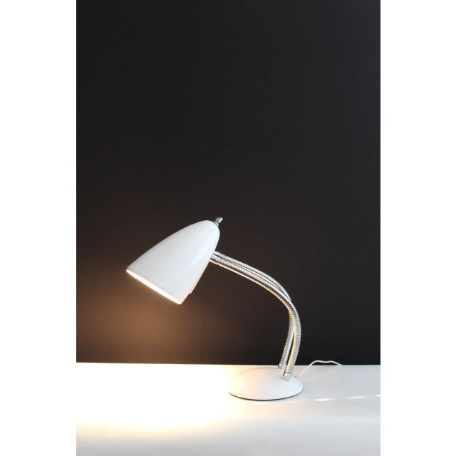 Gerald Thurston Style desk lamp .Beautiful sleek style. Sculptural bullet shades. Two adjustable necks for directing light...