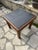 A rare small coffee table or side table from maison regain, created in the 1960s, with a solid oak frame weathered by time...