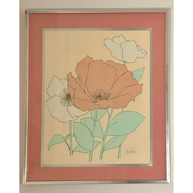 .A wonderfully chic pair of vintage floral prints dating to the 1970s, presented in their original brushed chrome-tone...