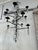 Blown glass ornaments with stamped faces and fish embellish the simplistic modern chandelier by Erik Hoglund. Hoglund was...