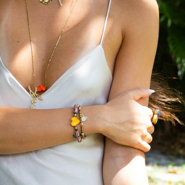 Evil Eye Blessings & Beaded Love Bracelet Set Bring color, charm, and powerful symbolism to your summer style with the...