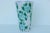 Mid-century Italian faience vase with a hand painted blue floral design. The blue flowers wrap around both sides of this...