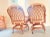 This set of Classic Rattan Grand Isle swivel tilt caster dining chairs are classic in style and elegant in design. The...