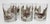Set of six vintage Edgar Watkins rocks glasses featuring an all-over butterfly pattern in rich brown and soft cream on...