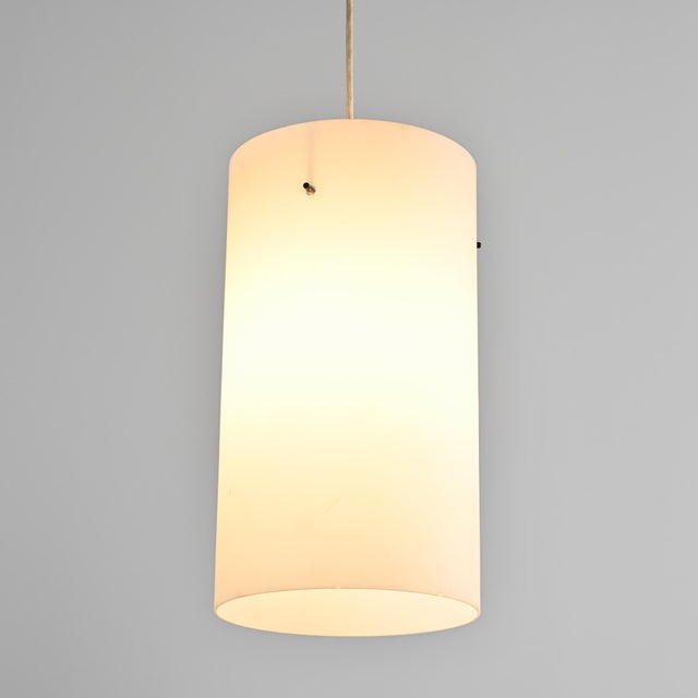 Conical pendant light in opaline glass, dating from the 1960s. The frosted white glass diffuser is held by an internal...