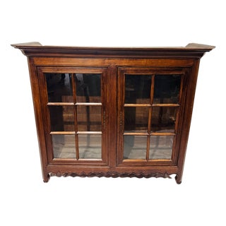 Antique English Oak Glass Door Bookcase Cabinet With Wavy Apron & Oversized Cornice For Sale