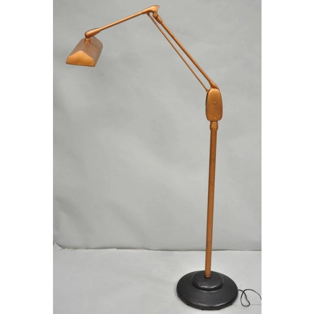 Vintage Dazor Industrial Modern Floating Tall Articulating Adjustable Metal Task Floor Lamp Painted in a Copper Color....