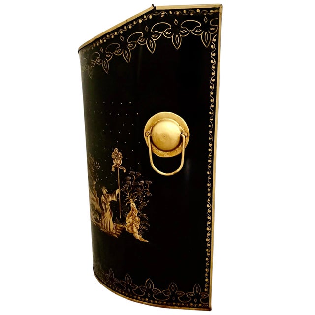 A rare find, this piece from Sarreid Ltd was inspired by an antique 19th-century English tole coal scuttle featuring...