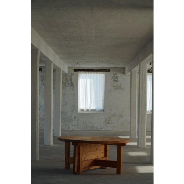 This Danish mid-century modern extendable table is made from solid pine and features a warm, rich patina that highlights...