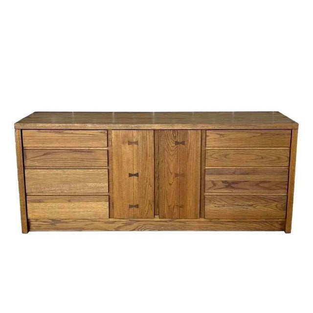 Classic mid century solid oak dresser or sideboard from Russell Wright for Conant Ball. Easily functions as a dining room...
