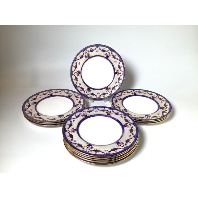 White A set of twelve dinner plates by Royal Doulton, a renowned English ceramic mfg. For Sale - Image 8 of 9