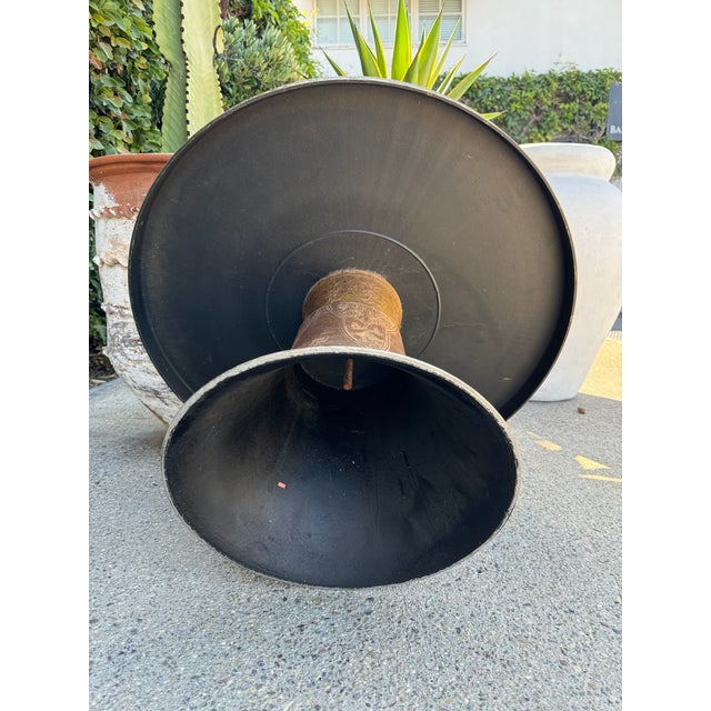 Vintage Japanese metal coffee table with a round top and pedestal base. Suitable for use as a coffee table or low accent...