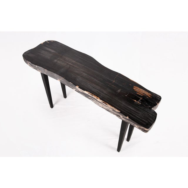 Made of one slab of petrified wood with beautiful natural flowing grain. The top of the slab is polished to show its...