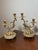 Sturdy and elegant with a heavy marble base, this candelabra set brings timeless charm to vintage, modern or formal decor...
