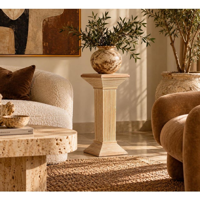 Beautiful vintage 1980s pedestal featuring an elegant architectural design crafted from pencil reed rattan. The square...