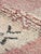 Vintage Rose Pink Moroccan Rug | Handwoven Berber Wool Rug with Diamond Medallions This vintage Moroccan rug features a...
