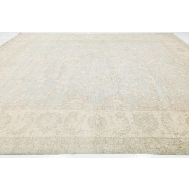Cream Hand-Knotted Modern Peshawar Wool Rug – Muted Light Blue & Cream Floral Design For Sale - Image 8 of 11