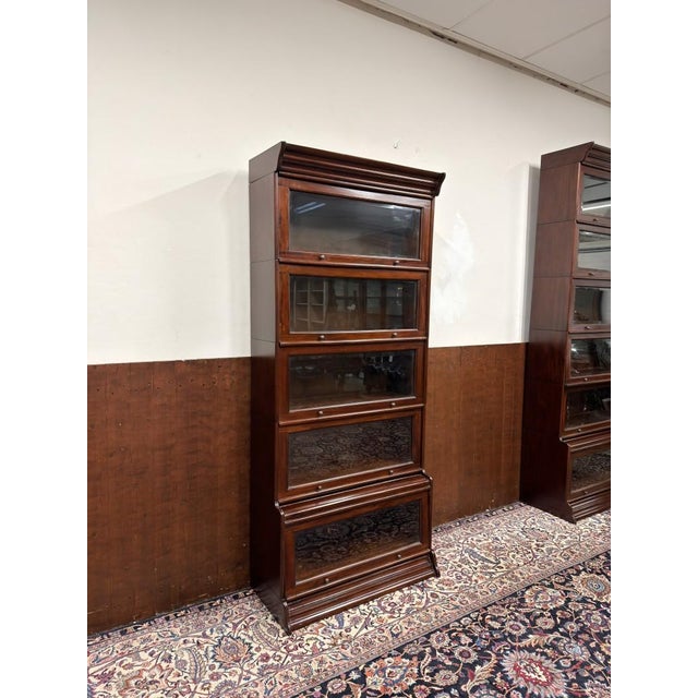 Classic and Elegant | Bookcases and cabinets in all shapes and sizes! This beautiful bookcase is the eye-catcher for your...
