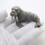 This rare vintage silver animal sculpture depicts a walrus, crafted as a desktop accent, library display piece, or cabinet...