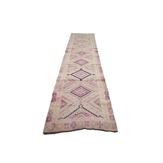 Vintage handknotted decorative runner from South Eastern Turkey. Approximately 50-60 years old. In very good condition.