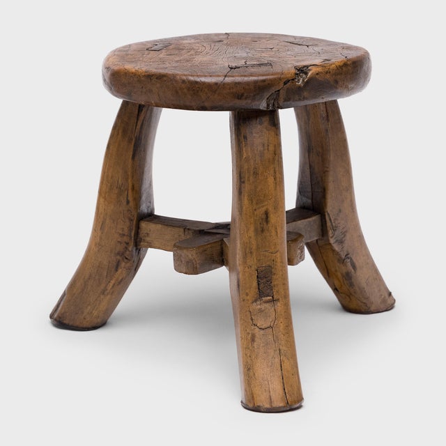 With rustic texture and simplicity of form, this petite 19th-century stool is a timeless example of casual seating in...