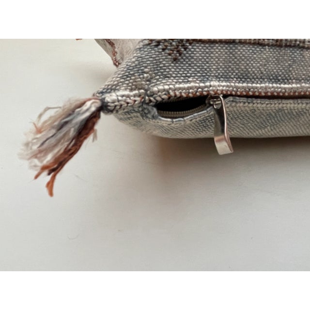 The Moroccan Cactus Pillow is a masterpiece handcrafted by local Berber artisans. This thoughtfully decorated pillow is a...