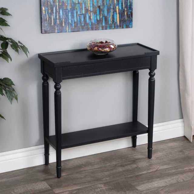 This casually styled console is the ideal size for a hall, entryway or stairwell landing. Crafted from selected solid...