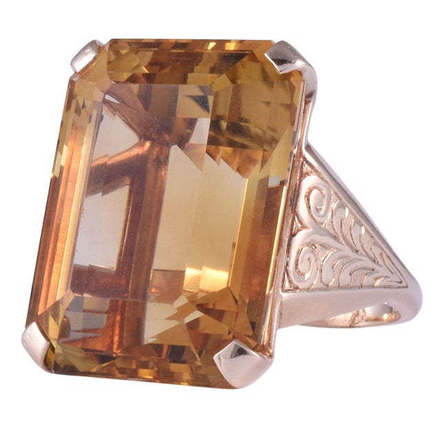 This is part of Chairish’s Fine Jewelry assortment. Vintage 33 carat natural untreated citrine 14K gold ring, circa 1950....
