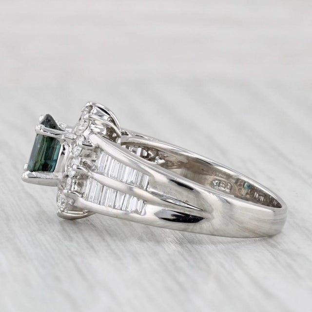 Gemstone Information: - Natural Sapphire - Carats - 0.90ct Cut - Oval Brilliant Color - Dark Blue Treatment - Heated -...