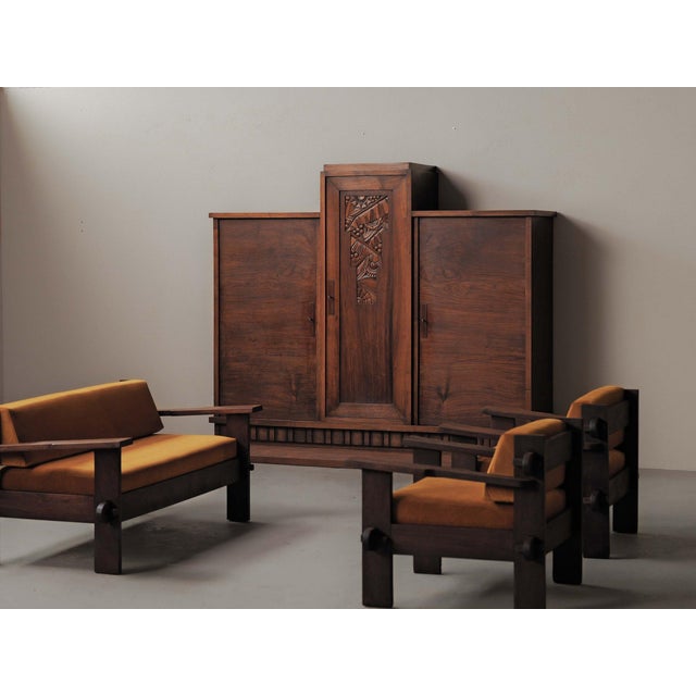 Art Deco sideboard, crafted in solid walnut and walnut veneer, was designed around 1930 by Jacques Philippe. A sculptor...