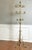 Three-tier revolving gilt wrought iron hall tree coat stand and hat rack in the manner of Hans Koegl, Italy, 1950s. A...
