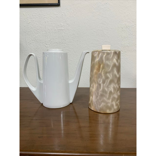 The MCM Bauscher Weiden Germany Bavaria Porcelain Insulated Jug Coffee/Tea Pot is a vintage teapot/coffee pot made of...