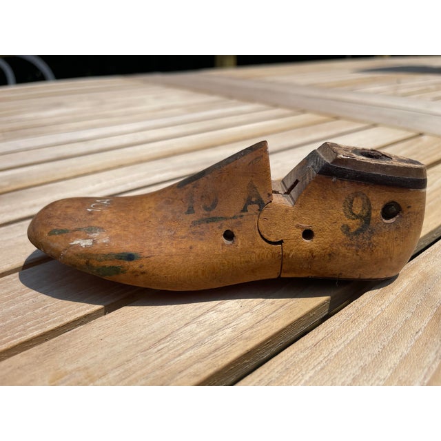 Unique collection of children’s shoe forms from the early 20th Century. Two have metal details on the top and heels....