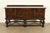 An exceptional antique English Jacobean or Tudor style sideboard, buffet, credenza, or bar cabinet By Berkey & Gay USA,...