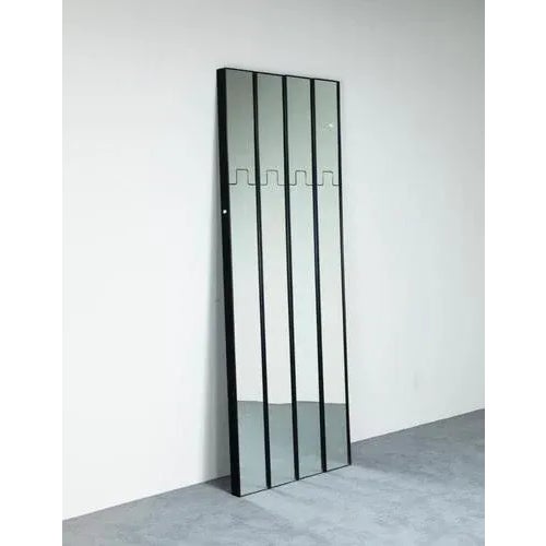 Four Gronda wall coat hangers in plastic, mirrored glass and acrylic glass. made by Luciano Bertoncini for the Elco...