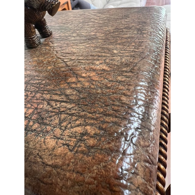 Elegant Maitland Smith jewelry or storage box has textured brown elephant leather exterior with two wooden drawers. Top is...