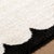 Step into the realm of cozy minimalism with the Fossay Shag area rug, where modern design meets plush comfort. This...