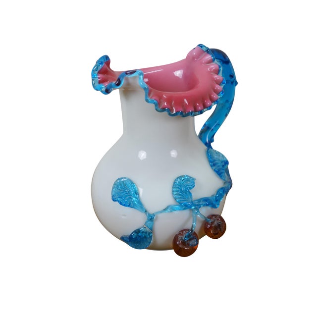 Antique Victorian Bohemian UV glass pitcher featuring ruffled clambroth top with vine handle and cherries. Attributed to...