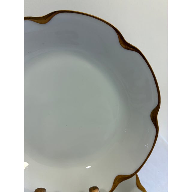 Elegant set of 6 antique Haviland & Co. Limoges porcelain bowls with a white body and hand-applied gold trim. Each bowl...