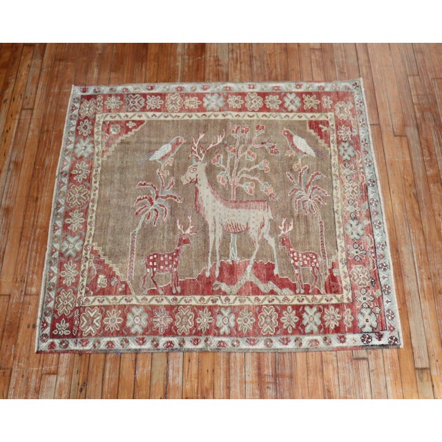 One of a kind hand-knotted Turkish Anatolian Rug in pale peach, brown, and green accents depicting 3 deers and 2 birds,...
