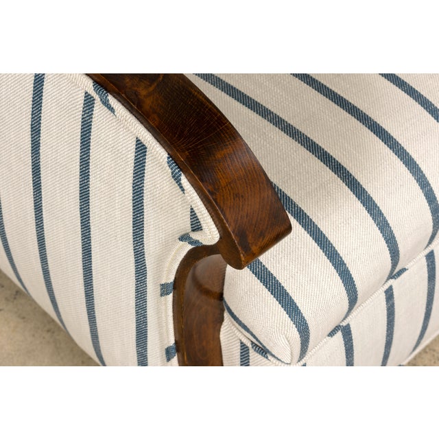 Sourced in Provence, France, this French Art Deco armchair dates to the 1930s and has been fully restored while preserving...