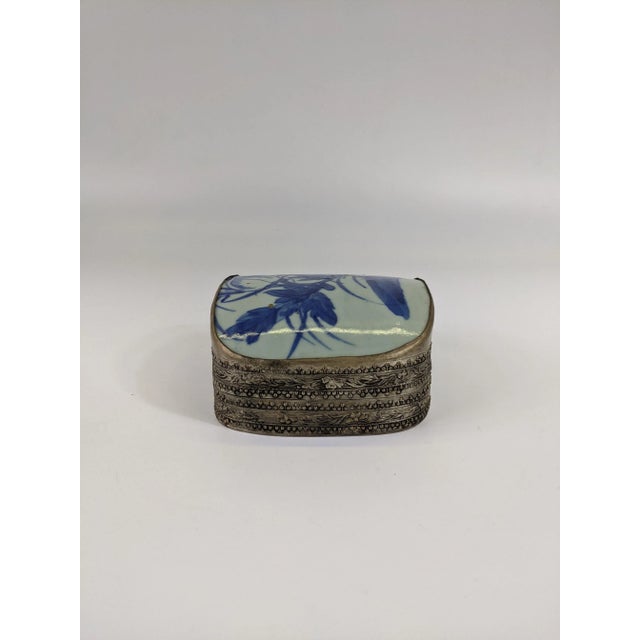 Blue and white porcelain mounted to a silver plated brass box